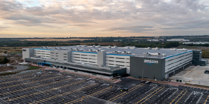 Leeds, UK - August 22, 2022. Aerial view of a large Amazon Prime distribution warehouse at Gateway 45 near the M1 motorway in Leeds, UK