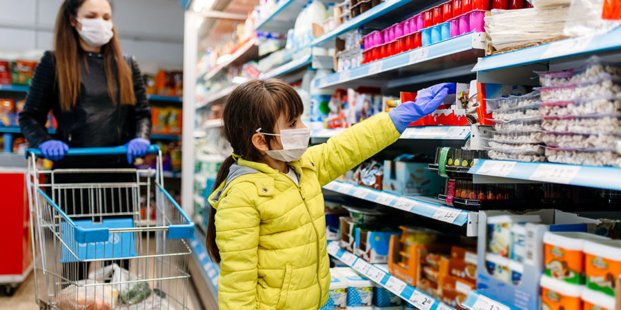 mother and daughter wearing masks and gloves and shopping mother and daughter wearing masks and gloves and shopping